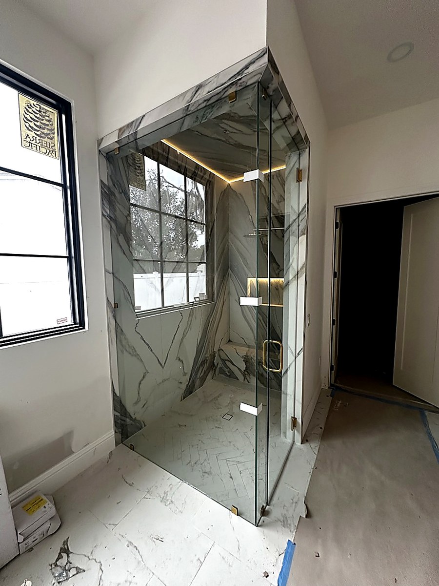 Marble shower under construction by KV Tileworks, Central Florida