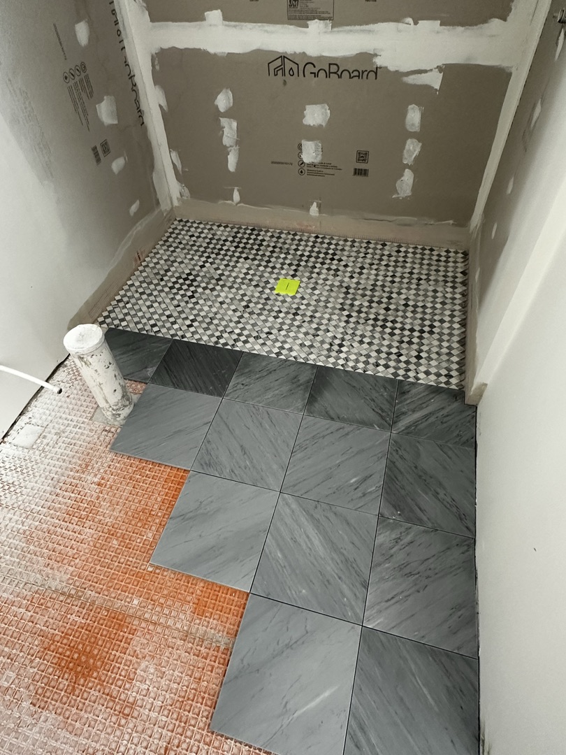 GoBoard foam tile backer installed on shower walls with niche framed out, ready for tile - KV Tileworks